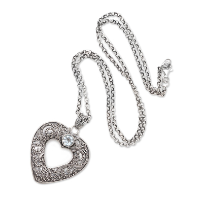 Blue topaz pendant necklace, 'Lucky Me' - Blue Topaz Pendant Necklace with Heart Motif