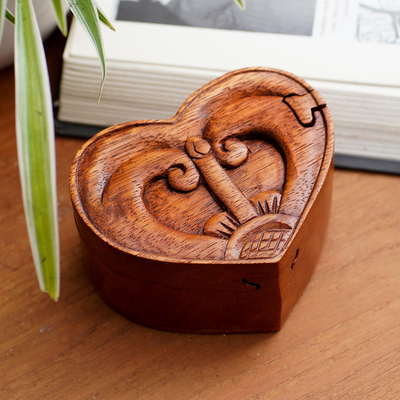 Wood puzzle box, 'Tug of Love' - Artisan Crafted Suar Wood Puzzle Box