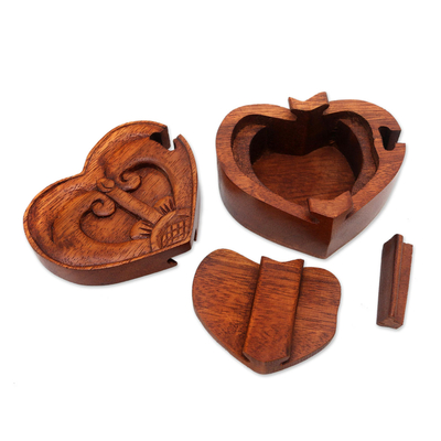 Wood puzzle box, 'Tug of Love' - Artisan Crafted Suar Wood Puzzle Box