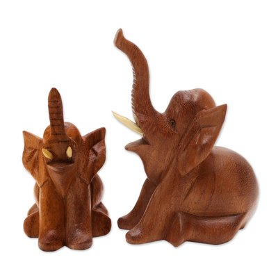Wood statuettes, 'Play Date' (pair) - Hand Carved Suar Wood Elephant Statuettes (Pair)