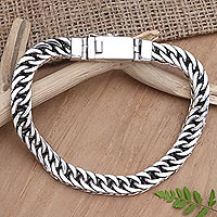 Men's sterling silver chain bracelet, 'Cool Twist' - Men's Handcrafted Sterling Silver Chain Bracelet