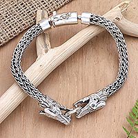 Men's sterling silver pendant bracelet, 'Dragon's Fight' - Men's Sterling Silver Pendant Bracelet with Dragon Motif