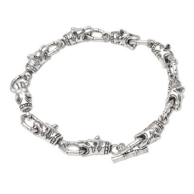Men's sterling silver link bracelet, 'On the Hunt' - Men's Sterling Silver Link Bracelet with Lion Motif