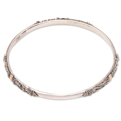 Gold-accented bangle bracelet, 'Mountain Pass' - Gold-Accented Sterling Silver Bangle Bracelet