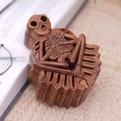 Wood puzzle box, 'Bare Bones' - Handmade Suar Wood Puzzle Box with Skeleton Motif