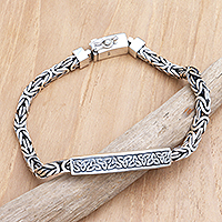 Men's sterling silver pendant bracelet, 'Celtic Wave' - Artisan Crafted Sterling Men's Celtic Trinity Knot Bracelet