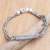 Men's sterling silver pendant bracelet, 'Celtic Wave' - Artisan Crafted Sterling Men's Celtic Trinity Knot Bracelet (image 2) thumbail