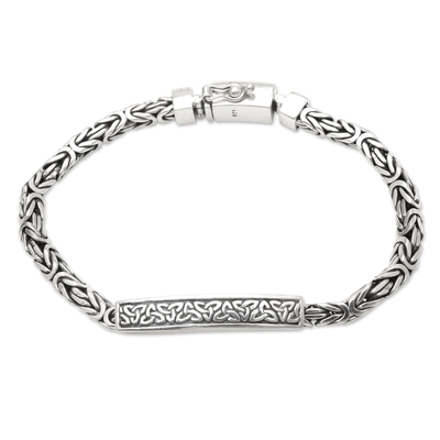 Men's sterling silver pendant bracelet, 'Celtic Wave' - Artisan Crafted Sterling Men's Celtic Trinity Knot Bracelet