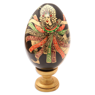 Wood egg sculpture, 'Baris Gede Dance' - Dance-Themed Balinese Sculpture