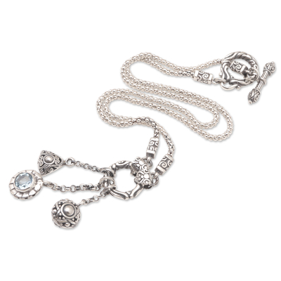 Blue topaz pendant necklace, 'Arctic Sun' - Sterling Silver and Blue Topaz Pendant Necklace