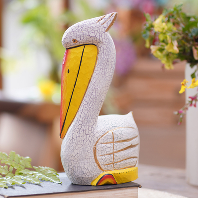 Wood statuette, 'Pelican Crossing in White' - Hand Crafted Albesia Wood Pelican Statuette