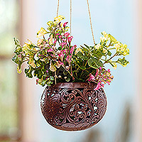 Coconut shell hanging planter, 'Tropical House in Bloom' - Artisan Crafted Coconut Shell Hanging Planter