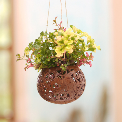 Coconut shell hanging planter, 'Tropical House in Turtle' - Handcrafted Coconut Shell Hanging Planter from Bali