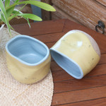 Ceramic teacups, 'Yellow Squeeze' (pair) - Rustic Ceramic Teacups from Java (Pair)