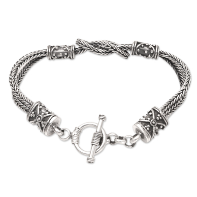 Sterling silver pendant bracelet, 'Strength of Love' - Unisex Sterling Silver Naga Chain Pendant Bracelet from Bali