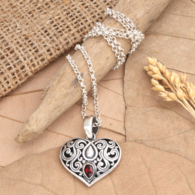 Garnet pendant necklace, 'Believing Heart' - Garnet Pendant Necklace with Heart Motif