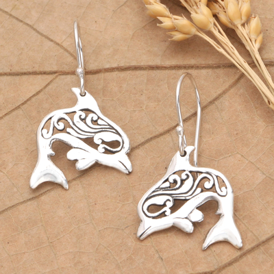 Sterling silver dangle earrings, 'Dolphin Dive' - Sterling Silver Dangle Earrings with Dolphin Motif