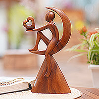 Wood sculpture, 'A Father's Hope' - Suar Wood Figure Sculpture with Heart Motif