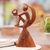 Wood sculpture, 'A Father's Hope' - Suar Wood Figure Sculpture with Heart Motif (image 2) thumbail