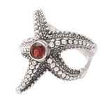 Garnet cocktail ring, 'Red Starfish' - Garnet Sterling Silver Starfish Cocktail Ring from Bali