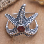 Garnet cocktail ring, 'Red Starfish' - Garnet Sterling Silver Starfish Cocktail Ring from Bali