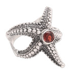 Garnet cocktail ring, 'Red Starfish' - Garnet Sterling Silver Starfish Cocktail Ring from Bali