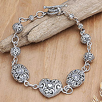 Sterling silver link bracelet, 'Swirls of Love'