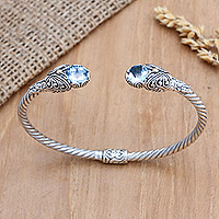 Gold-accented blue topaz cuff bracelet, 'Blue Beverage' - Balinese Blue Topaz and Sterling Silver Cuff Bracelet
