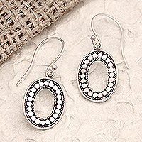 Sterling silver dangle earrings, 'Flowing Ovals' - Handmade Oval Sterling Silver Dangle Earrings from Bali