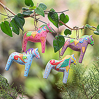 Wood ornaments, 'Dala Winter' (set of 4) - Set of 4 Handmade Wooden Equine Ornaments for Christmas