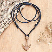 Men's wood pendant necklace, 'Sturdy Anchor' - Men's Sawo Wood Anchor Pendant Necklace with Cotton Cord