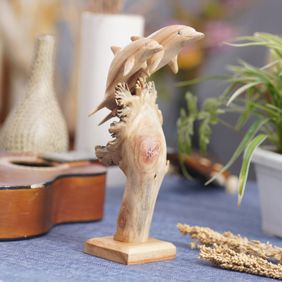 Wood sculpture, 'Mother Dolphin' - Carved Jempinis Wood Dolphin Sculpture with Natural Base