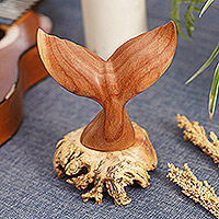 Wood sculpture, 'Dolphin Tail' - Hand-Carved Jempinis Wood Sculpture with Natural Base