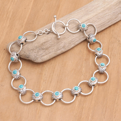 Sterling silver link bracelet, 'Embrace in Teal' - Handmade Balinese Reconstituted Turquoise Link Bracelet