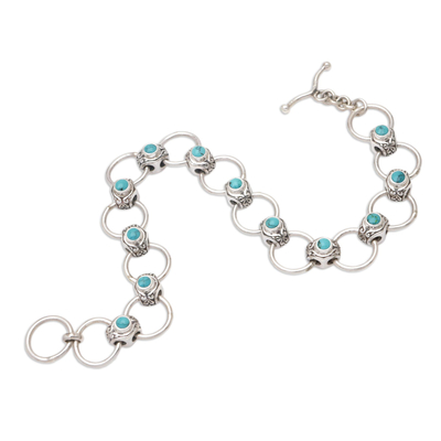 Sterling silver link bracelet, 'Embrace in Teal' - Handmade Balinese Reconstituted Turquoise Link Bracelet