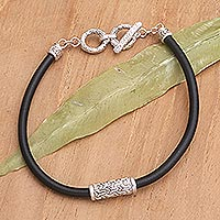 Sterling silver pendant bracelet, 'Modest Charm' - Balinese Sterling Silver Pendant Bracelet with Black Cord