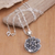 Sterling silver pendant necklace, 'Flowers for Canang' - Balinese Sterling Silver Pendant Necklace with Floral Motifs