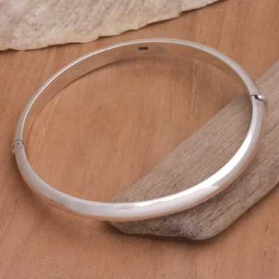 Sterling silver bangle bracelet, 'Radiant Loop' - Sterling Silver Bangle Bracelet with High Polish Finish