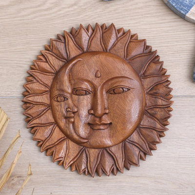 Wood relief panel, 'Divine Universe' - Hand-Carved Suar Wood Relief Panel with Sun and Moon Design