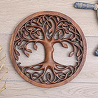 Wood relief panel, 'Leaf Generation' - Hand-Carved Suar Wood Round Relief Panel with Tree