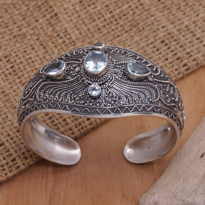 Blue topaz cuff bracelet, 'Bali's Nature' - Blue Topaz and Sterling Silver Cuff Bracelet from Bali