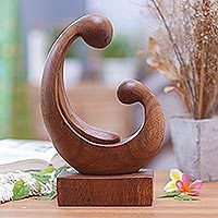 Wood sculpture, 'Motherly Tenderness' - Hand-Carved Suar Wood Sculpture with Mother and Child