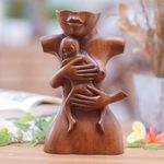 Wood sculpture, 'Maternal Affection' - Suar Wood Brown Sculpture with Hand-Carved Tender Scene