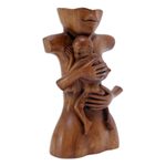 Wood sculpture, 'Maternal Affection' - Suar Wood Brown Sculpture with Hand-Carved Tender Scene