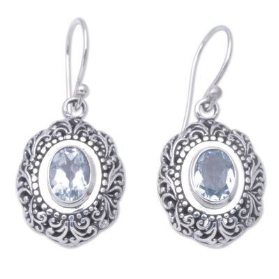 Blue topaz dangle earrings, 'Blue Medallion of Bali' - Balinese Sterling Silver Dangle Earrings with Blue Topaz