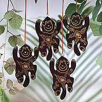 Mahogany wood ornaments, 'Happy Monkeys' (set of 4) - Set of 4 Mahogany Wood Hand-Painted Monkey Ornaments