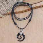 Horn and garnet pendant necklace, 'Midnight Halloween' - Spiral Horn Garnet and Sterling Silver Pendant Necklace