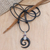 Horn and garnet pendant necklace, 'Midnight Halloween' - Spiral Horn Garnet and Sterling Silver Pendant Necklace