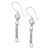 Blue topaz dangle earrings, 'Serene Journey' - Faceted Blue Topaz Sterling Silver Dangle Earrings from Bali