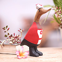Bamboo root and teak wood figurine, 'Nurse Duckling in Red' - Hand-Crafted Bamboo Root and Teak Wood Nurse Duck Figurine